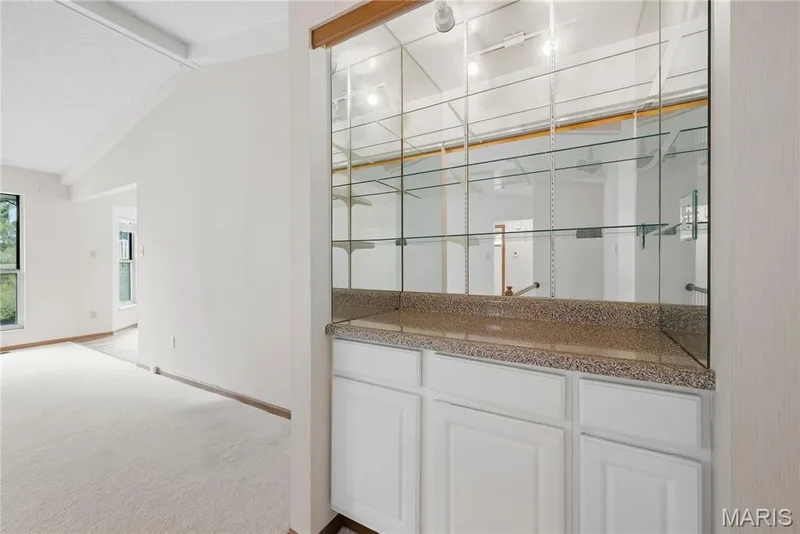 Built-In Entertainers Cabinetry with Cabinets, Stone-Look Counter, Mirrors, Lighting & Glass Shelves! — 1278 Stephenridge Drive, St Charles, MO 63304