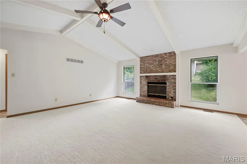 Vaulted Great Room with Wood Beam Details at the Ceiling and Ceiling Fan with Light! — 1278 Stephenridge Drive, St Charles, MO 63304