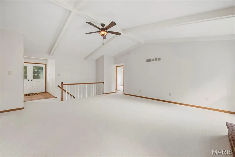 NEW Carpet and Wood Spindle Stairs leads to the Partially-Finished Lower Level! — 1278 Stephenridge Drive, St Charles, MO 63304