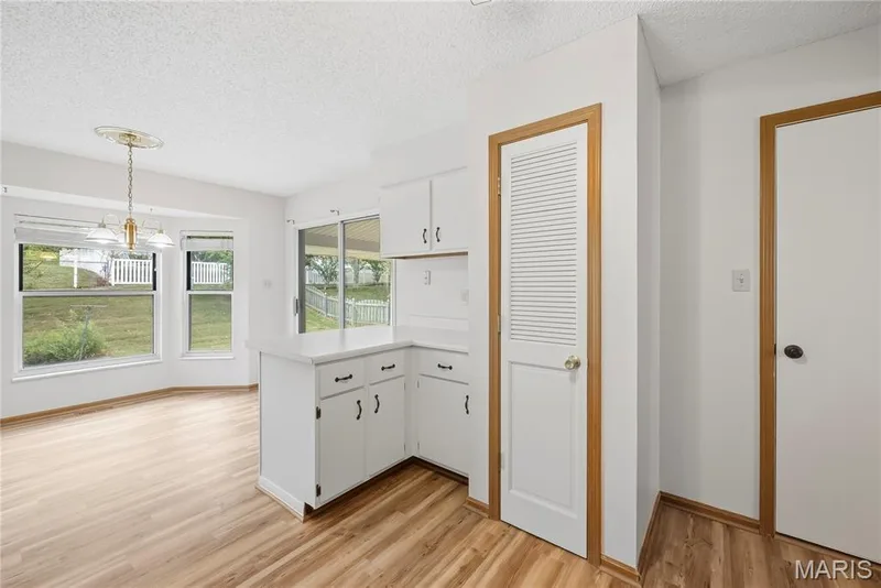 Kitchen Pantry Closet! Door pictured leads to the 2-Car Garage! — 1278 Stephenridge Drive, St Charles, MO 63304