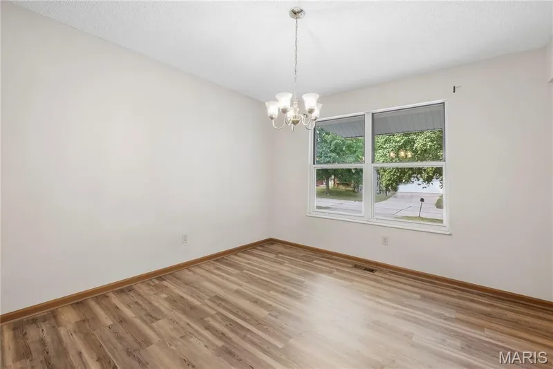 The Large Window really lets the Natural Light from the Covered Front Porch in! — 1278 Stephenridge Drive, St Charles, MO 63304