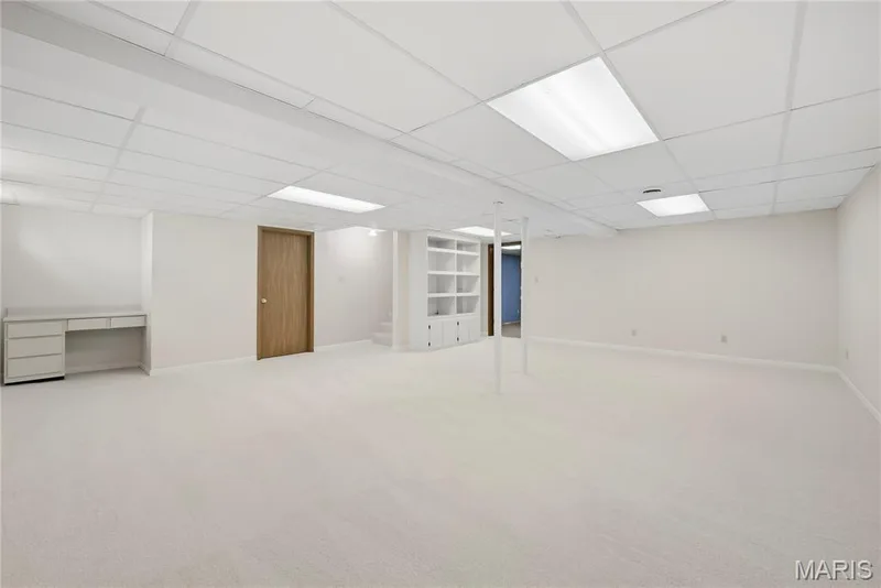Recreation Area has an extra Finished BONUS ROOM! Storage Area features Work Benches, Cabinetry, Hanging Rods & Pegboards! — 1278 Stephenridge Drive, St Charles, MO 63304