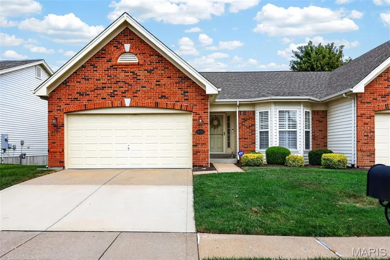 Brick facade with white siding accents — 14737 Ladue Bluffs Crossing Drive, Chesterfield, MO 63017