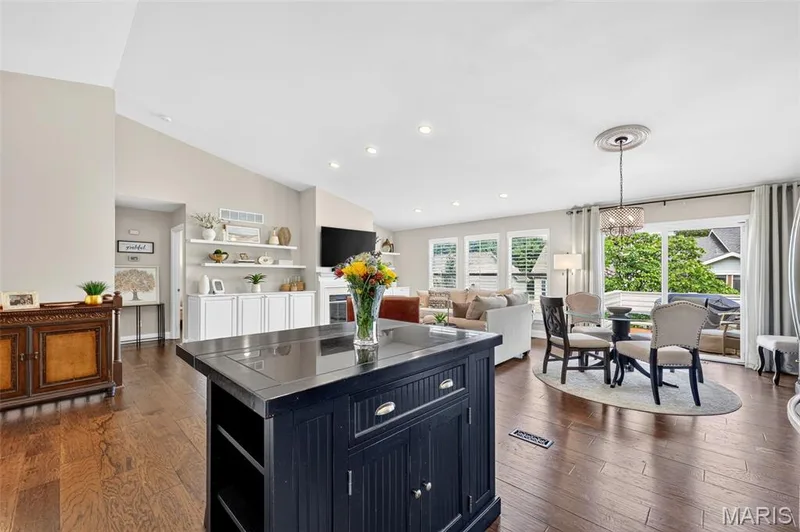 New wood floors throughout the open kitchen — 14737 Ladue Bluffs Crossing Drive, Chesterfield, MO 63017