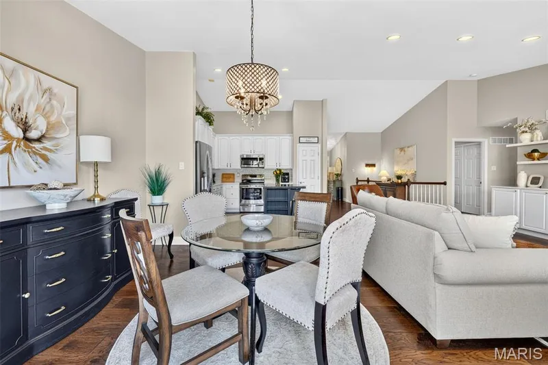 Recessed lighting, vaulted ceilings, wood flooring, white cabinetry, and built-in shelving — 14737 Ladue Bluffs Crossing Drive, Chesterfield, MO 63017