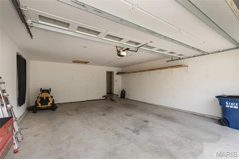 Oversized garage could fit a boat. 28 ft deep, all finished. — 10495 Walnut Lane, Foristell, MO 63348