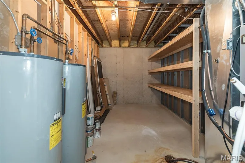 Utility Room with storage shelving — 10495 Walnut Lane, Foristell, MO 63348