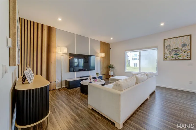 Great Room with Decorative Feature Wall — 337 Dalriada Boulevard, O'Fallon, MO 63368