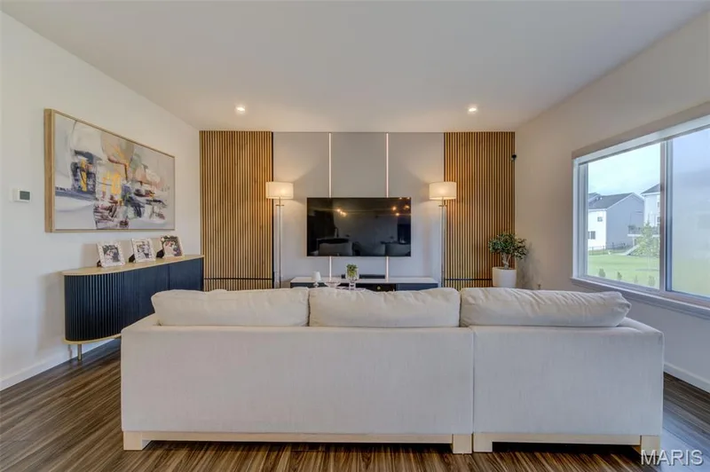 Great Room with Decorative Feature Wall — 337 Dalriada Boulevard, O'Fallon, MO 63368
