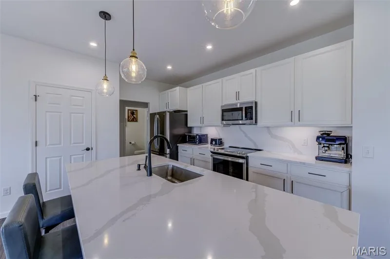 Large Center Island with  Quartz Countertop and Sink — 337 Dalriada Boulevard, O'Fallon, MO 63368