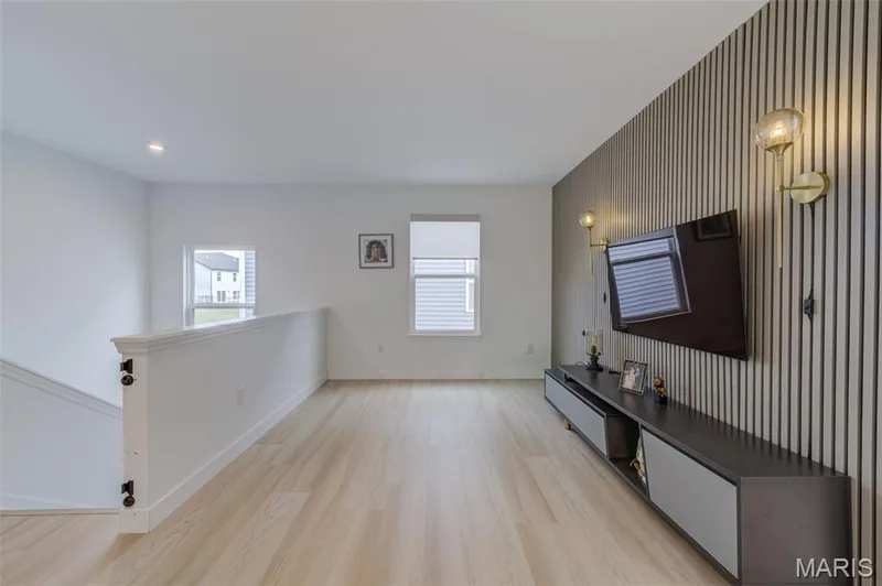 Upper Level Bonus Room with Wood Panel Feature Wall — 337 Dalriada Boulevard, O'Fallon, MO 63368
