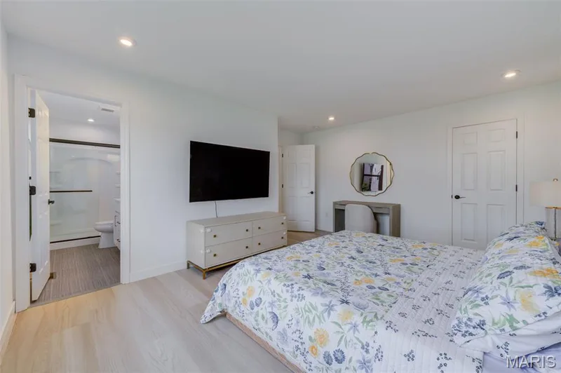 Primary Bedroom with Walk-in Closet and Ensuite Bathroom — 337 Dalriada Boulevard, O'Fallon, MO 63368