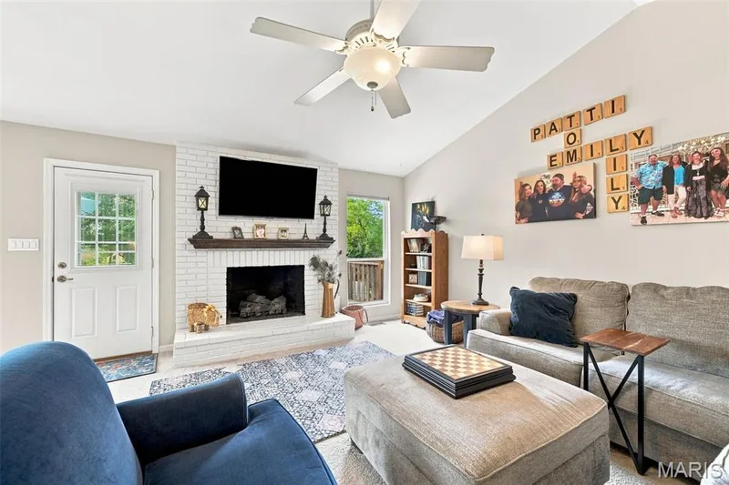 The main floor fireplace is an EASY gas iinsert...press a button and instant atmosphere! — 16337 Centerpointe Drive, Grover, MO 63040