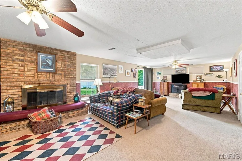 2nd bonus fireplace in the basement. Wood burning for the purist in you — 16337 Centerpointe Drive, Grover, MO 63040