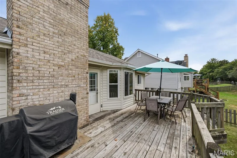 Deck is conveniently off of the kitchen for easy grilling access — 16337 Centerpointe Drive, Grover, MO 63040