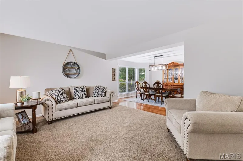 living room looking into dining room — 209 Harbour Pointe Drive, Grover, MO 63040