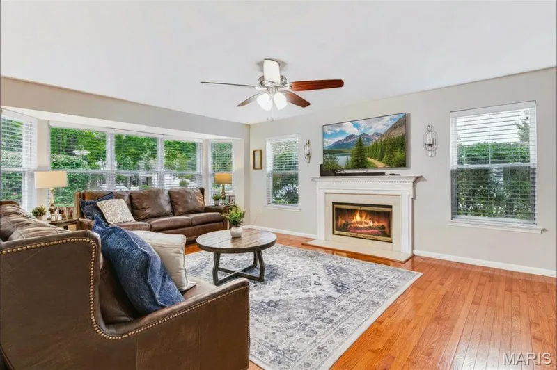 Family room with gas fireplace — 209 Harbour Pointe Drive, Grover, MO 63040