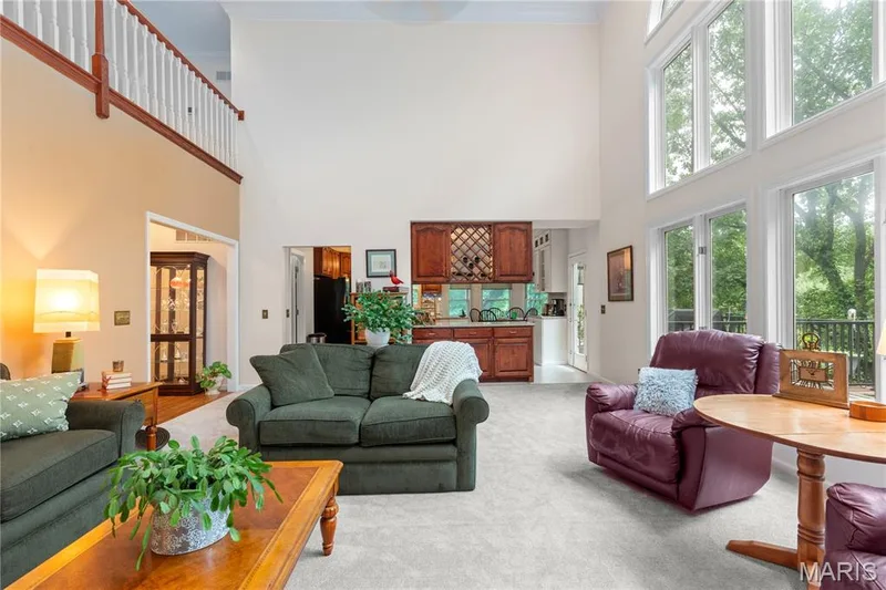 The 2-story great room connects to the kitchen creating a expansive open floor plan. — 19342 Dogwood Valley Court, Wildwood, MO 63038