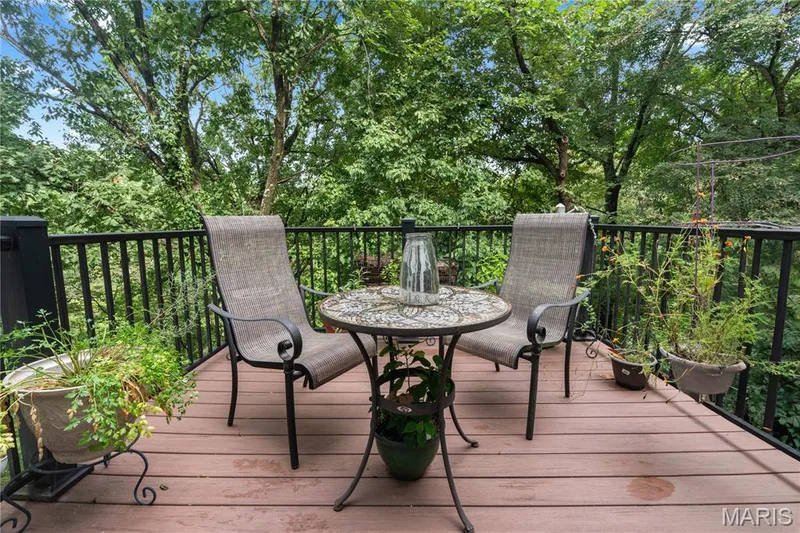 Take your freshly brewed coffe out onto the lovely, composite-made upper deck to watch the sun rise — 19342 Dogwood Valley Court, Wildwood, MO 63038