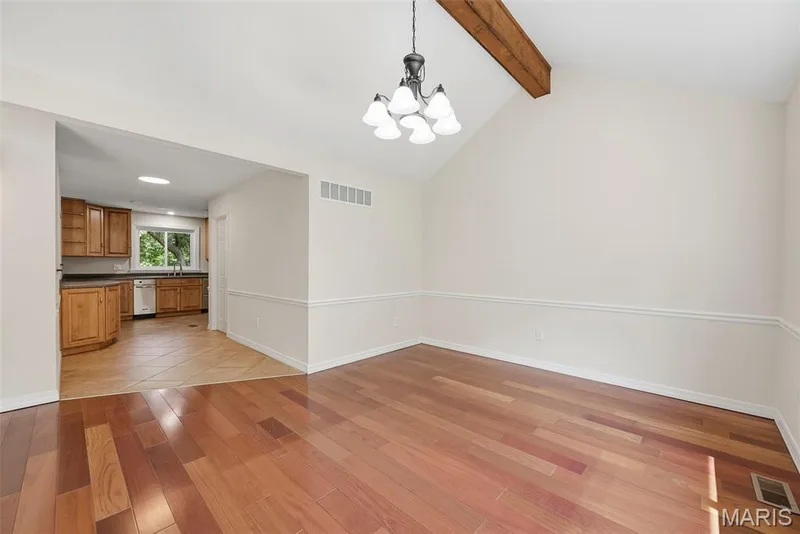 Dining room with view into the kitchen. — 18409 Woodland Meadows Drive, Wildwood, MO 63038