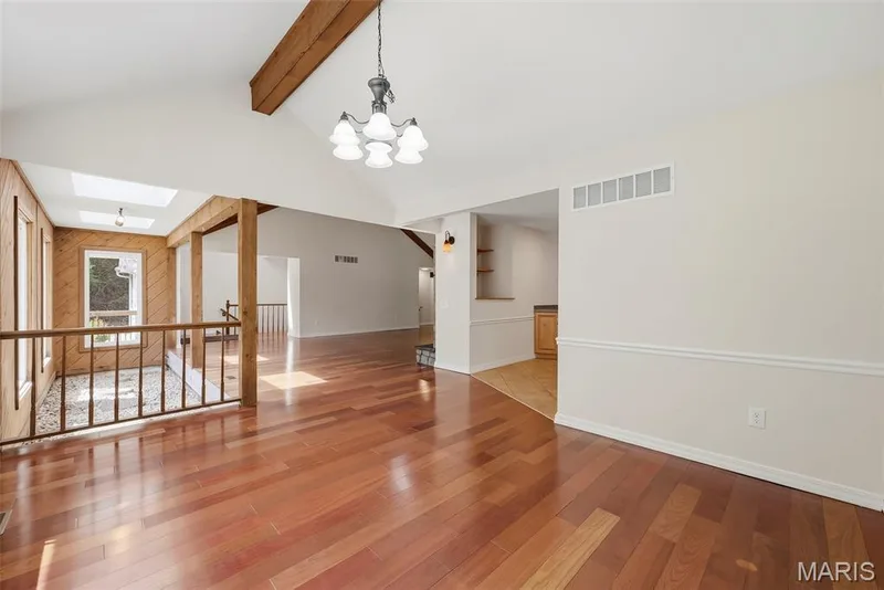 Dining room with view facing into the living room and atrium. — 18409 Woodland Meadows Drive, Wildwood, MO 63038