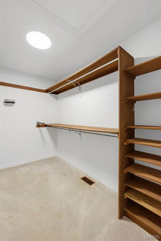 Primary bedroom walk in closet. — 18409 Woodland Meadows Drive, Wildwood, MO 63038