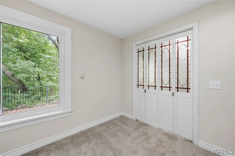 Doors to the bonus room attached to media room. — 18409 Woodland Meadows Drive, Wildwood, MO 63038