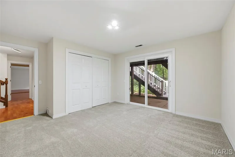 Bedroom number four located on the lower level with view to the back yard. — 18409 Woodland Meadows Drive, Wildwood, MO 63038
