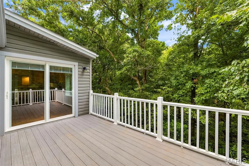 Deck with entry into the breakfast /kitchen area. — 18409 Woodland Meadows Drive, Wildwood, MO 63038