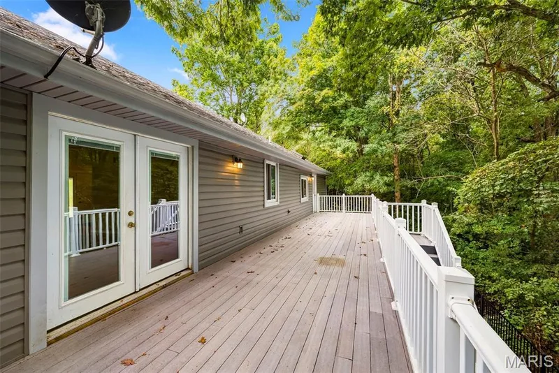 Deck with view to the living room area ON MAIN LEVEL. — 18409 Woodland Meadows Drive, Wildwood, MO 63038