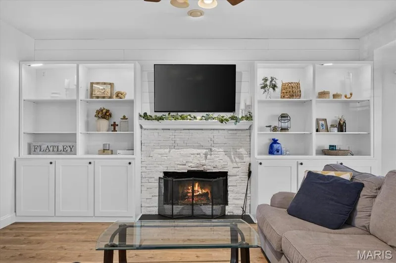 Living Room Wood Burning Fireplace — 708 Brook Manor Court, Lake St. Louis, MO 63367