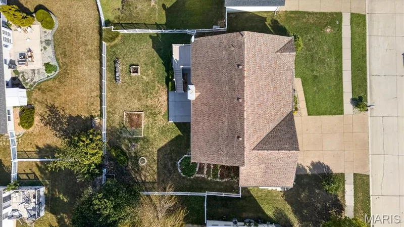Brown shingle roof, concrete driveway, and front walkway — 89 Gregory Court, Wentzville, MO 63385