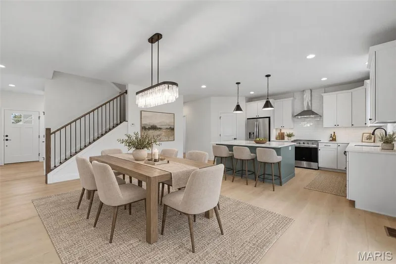 Dining Area and Kitchen shown with Virtual Staging — 547 Ryehill Drive, St Peters, MO 63376