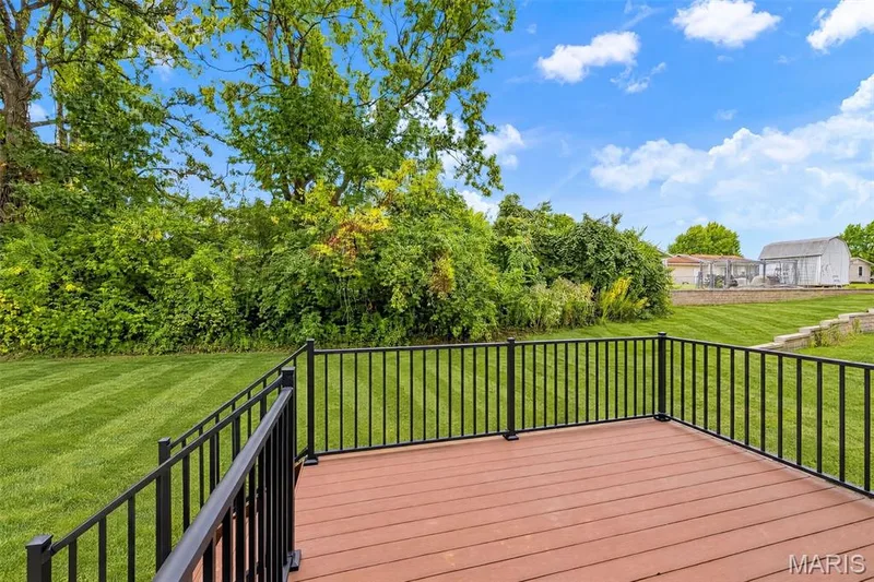 Composite Deck with Metal Railing and Steps to Yard — 547 Ryehill Drive, St Peters, MO 63376