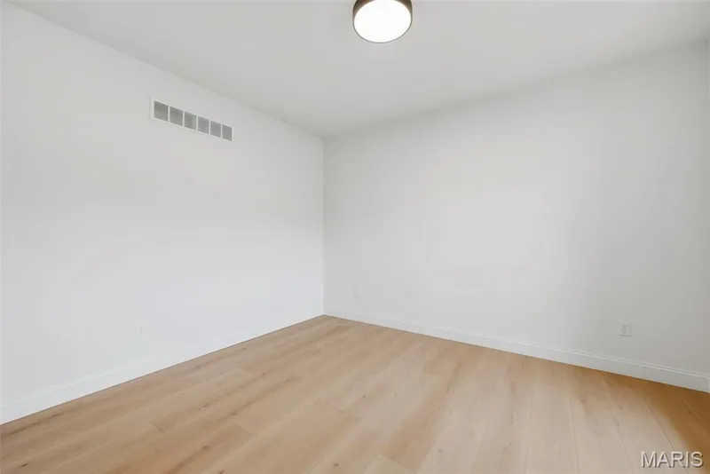 Main Floor Office with Luxury Vinyl Plank Flooring and 9 Foot Ceilings — 547 Ryehill Drive, St Peters, MO 63376