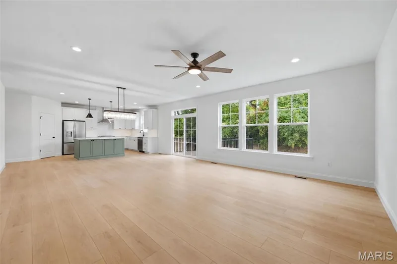 Open Floor Plan with 9 Foot Ceilings and Luxury Vinyl Plank Flooring — 547 Ryehill Drive, St Peters, MO 63376