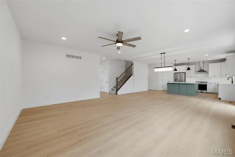 Great Room open to Dining Area and Kitchen with 9 Foot Ceilings — 547 Ryehill Drive, St Peters, MO 63376