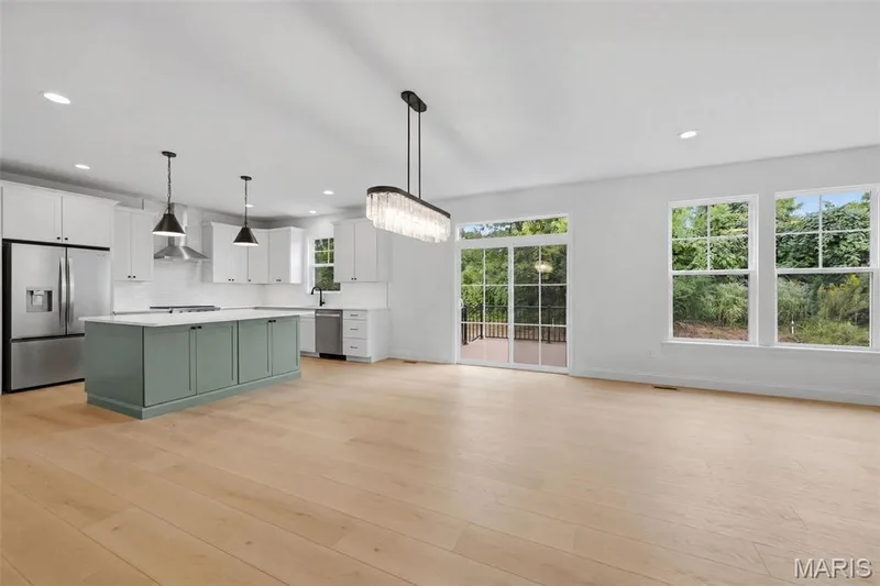 Dining Area with Sliding Glass Door opening to Composite Deck — 547 Ryehill Drive, St Peters, MO 63376