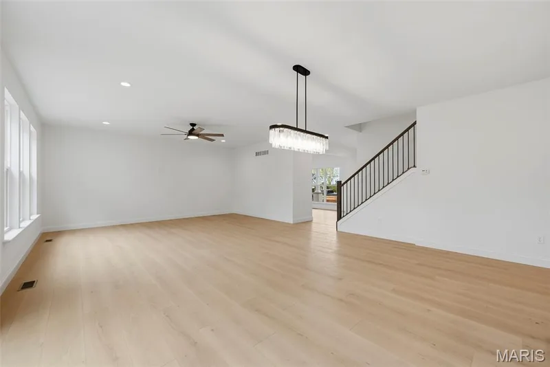 Dining Area and Great Room with 9 Foot Ceilings and Luxury Vinyl Plank Flooring — 547 Ryehill Drive, St Peters, MO 63376