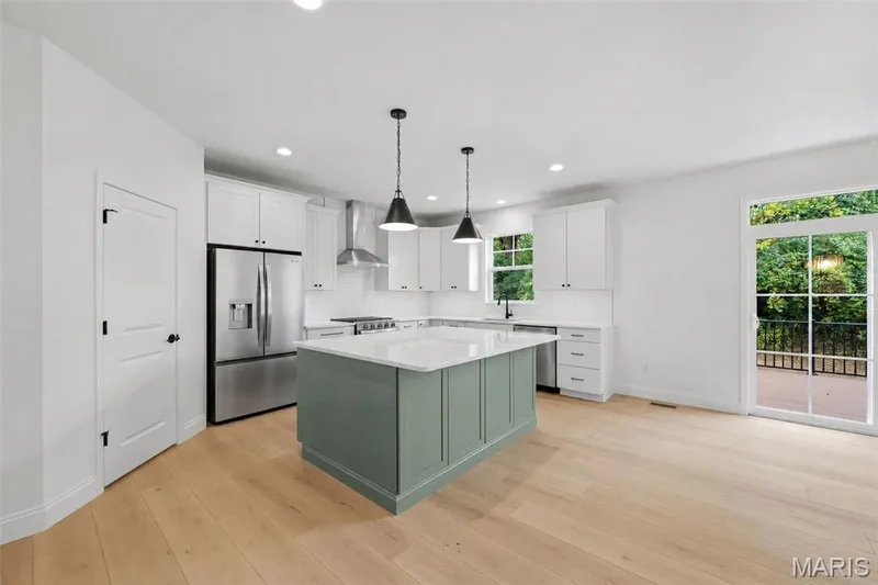 Kitchen with Walk in Pantry and Island with Seating Bar — 547 Ryehill Drive, St Peters, MO 63376