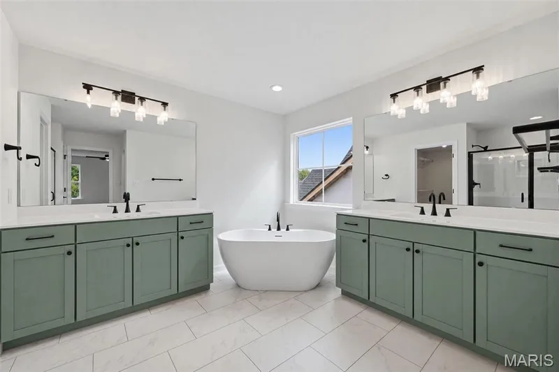 Luxury Primary Bath with Raised Height Vanities and Freestanding Soaking Tub — 547 Ryehill Drive, St Peters, MO 63376