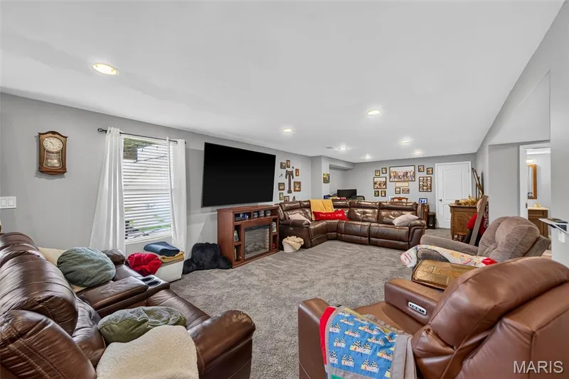 Entertainment Area in Finished Basement — 1516 Wainscott Drive, O'Fallon, MO 63366