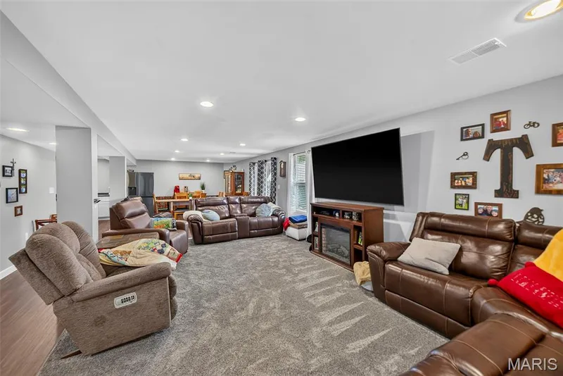 Entertainment Area in Finished Basement — 1516 Wainscott Drive, O'Fallon, MO 63366