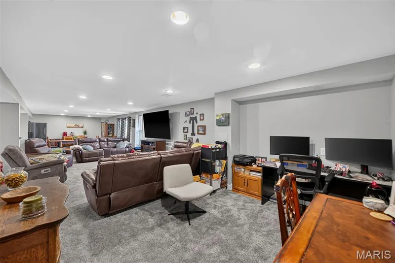 Entertainment Area in Finished Basement — 1516 Wainscott Drive, O'Fallon, MO 63366