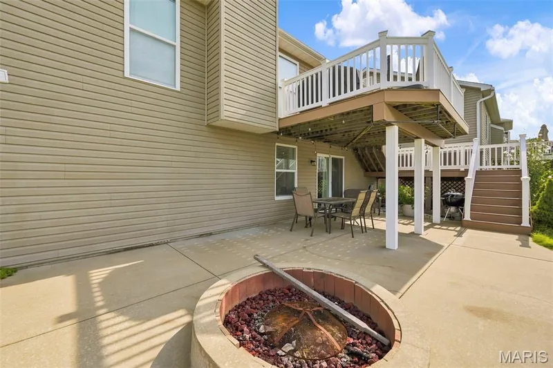 Firepit area on patio — 1516 Wainscott Drive, O'Fallon, MO 63366