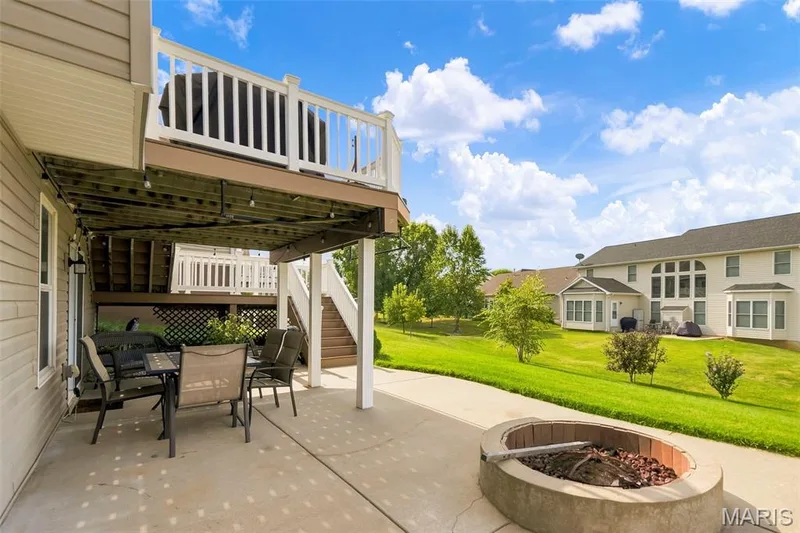 Firepit area on patio — 1516 Wainscott Drive, O'Fallon, MO 63366