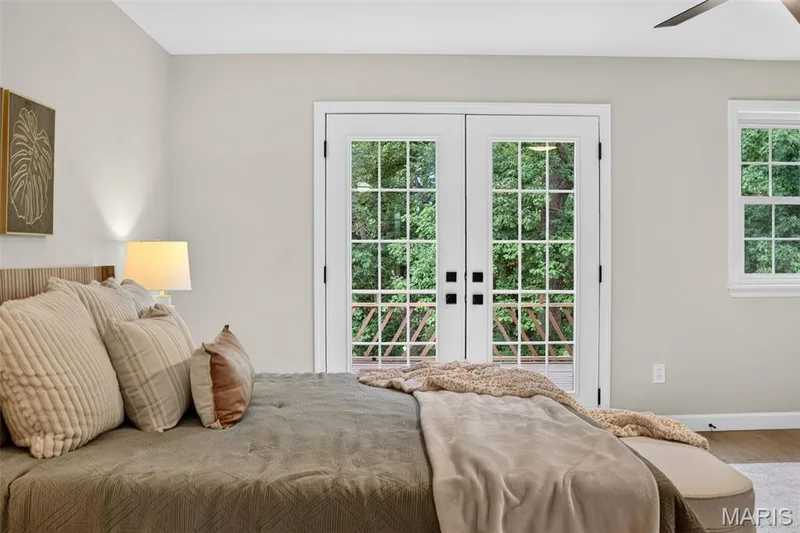 Fresh air all throughout the house with French doors to the back deck. — 1674 Old Baxter Road, Chesterfield, MO 63017
