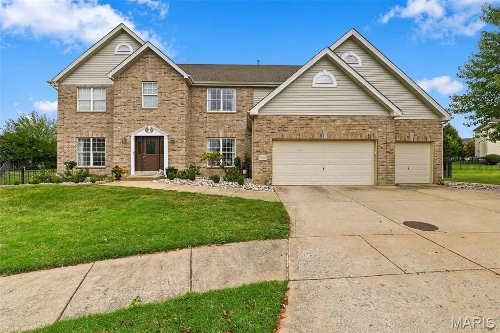 Brick and siding exterior with gabled roof lines — 1000 Gardenbridge Place, St Charles, MO 63303