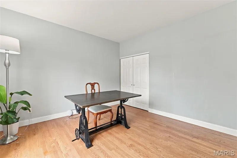 Light-toned wood floors complement the neutral wall color — 1000 Gardenbridge Place, St Charles, MO 63303