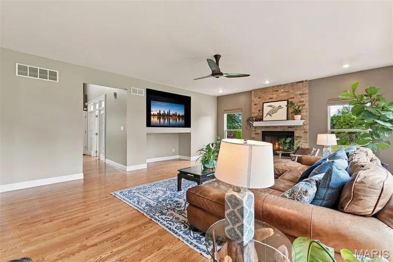 View of living room with built-in media niche — 1000 Gardenbridge Place, St Charles, MO 63303